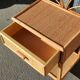Pair of rattan bedsides, a drawer