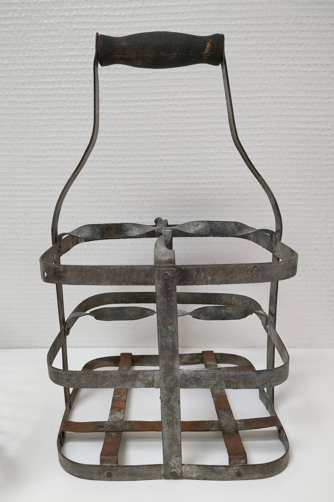 Two baskets metal and patinated wood early twentieth century
