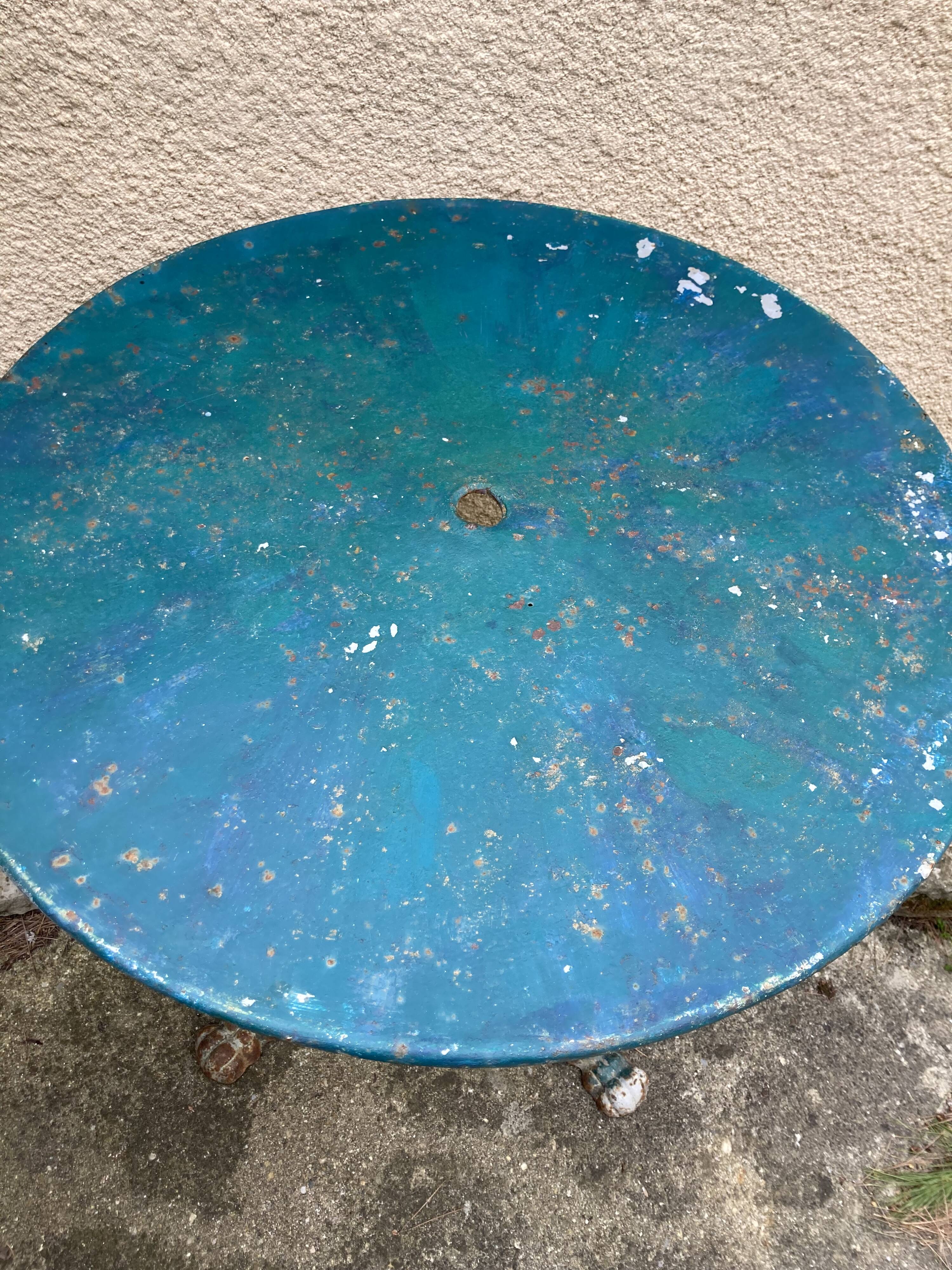 Old wrought iron garden table