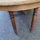 Round extendable dining table Napoleon III renovated in 19th-century oak.