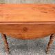 Round solid oak table with extensions, cabinetmaker's sliding mechanism,