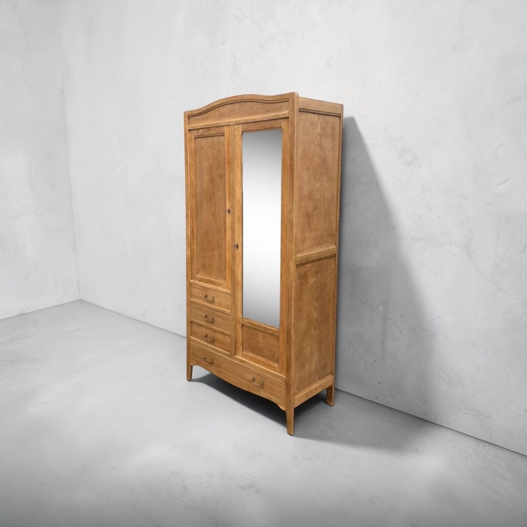 Parisian hotel wardrobe with bevelled mirror, solid raw oak, 1920.