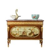 Empire style chest of drawers in lacquer, bronze and marble. Nineteenth century.