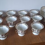 Set of 11 cups and saucers