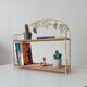 Vintage wall shelf or freestanding wicker in bohemian style.
