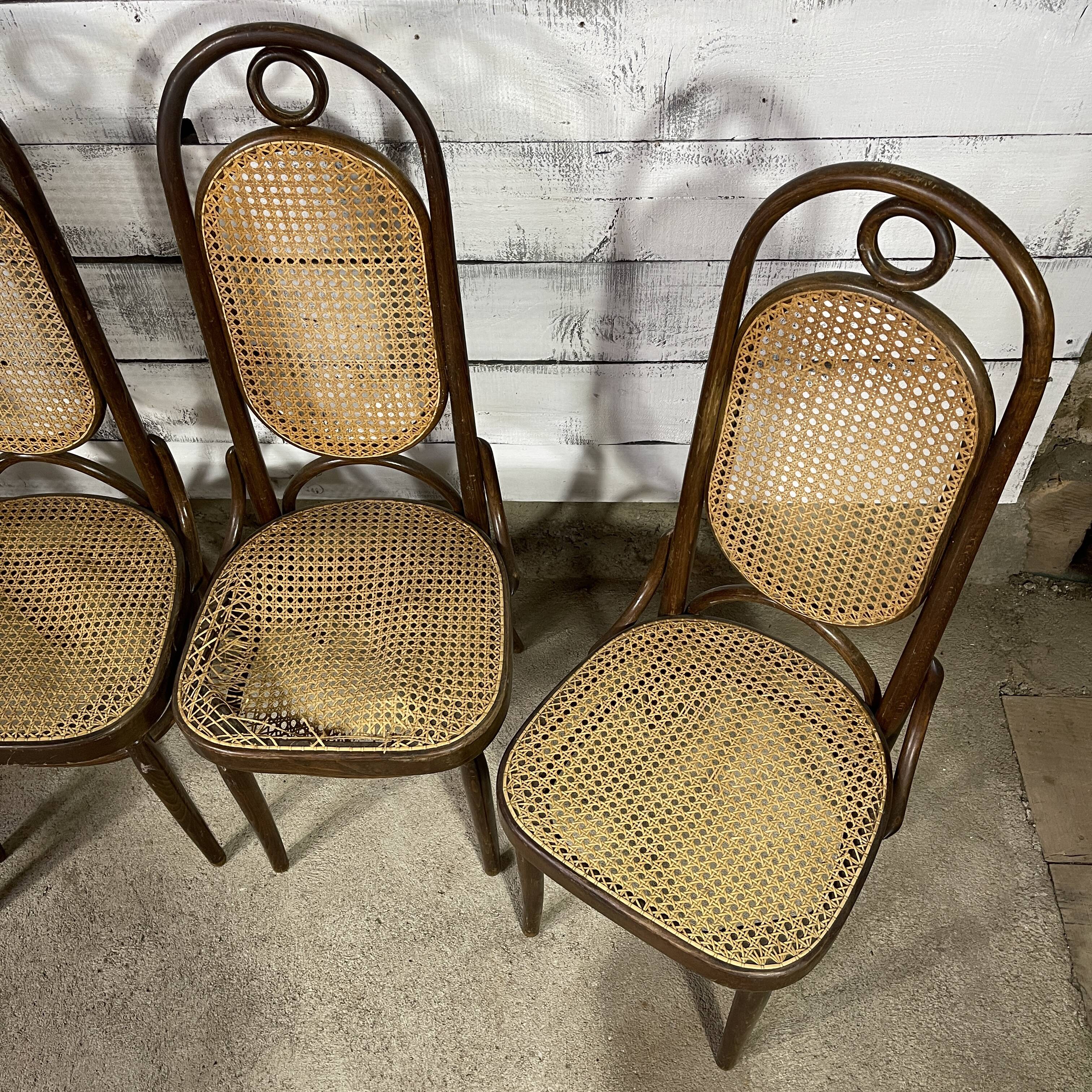 Series of 4 canned bistro chairs