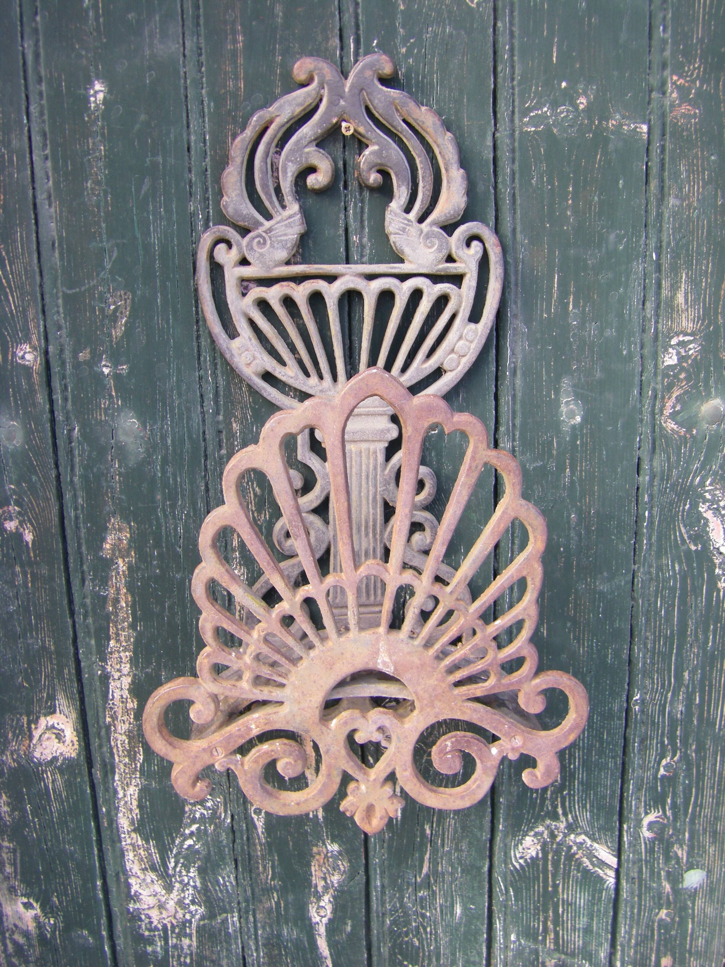 Cast iron garden pipe holder