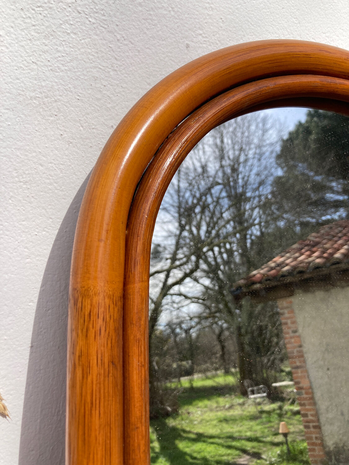 Vintage ethnic rattan mirror