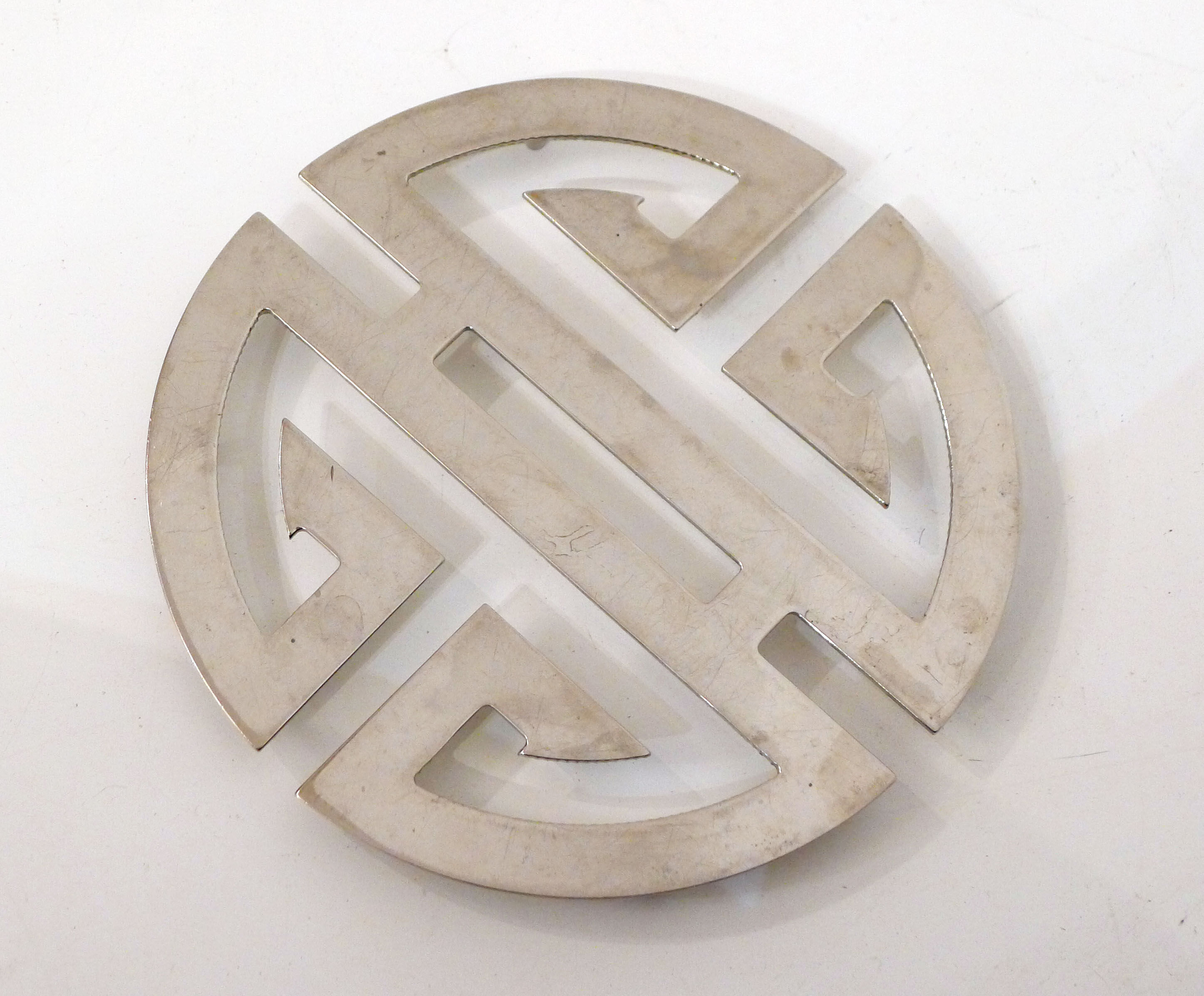 Under the geometric plate opened