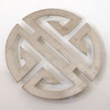 Under the geometric plate opened