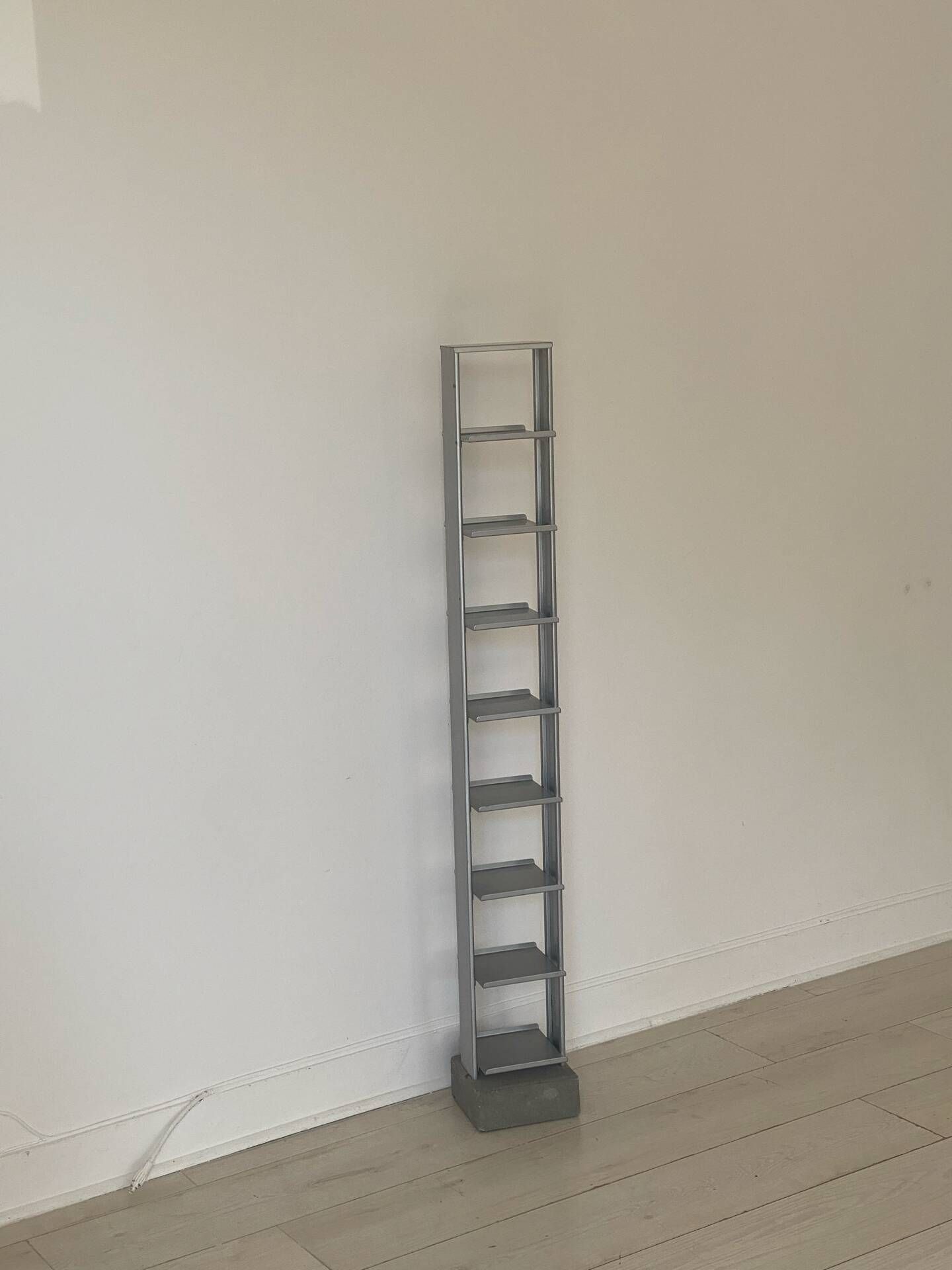 Metal tower and concrete block storage