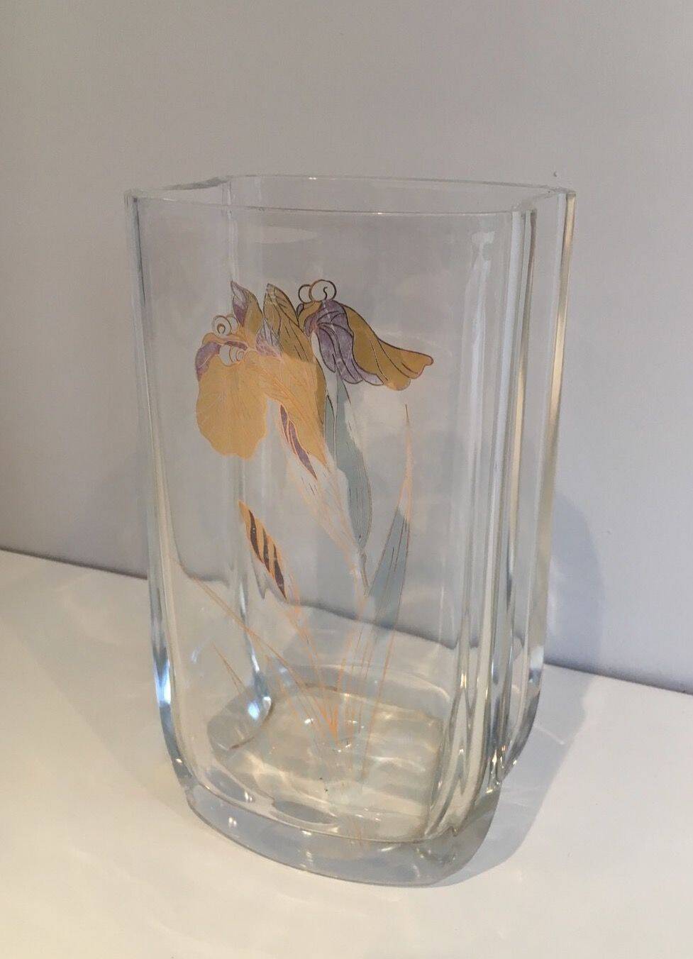 Glass vase with a decoration of a golden flower, around 1970.