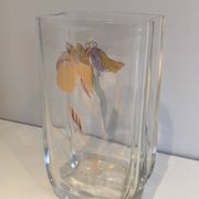 Glass vase with a decoration of a golden flower, around 1970.
