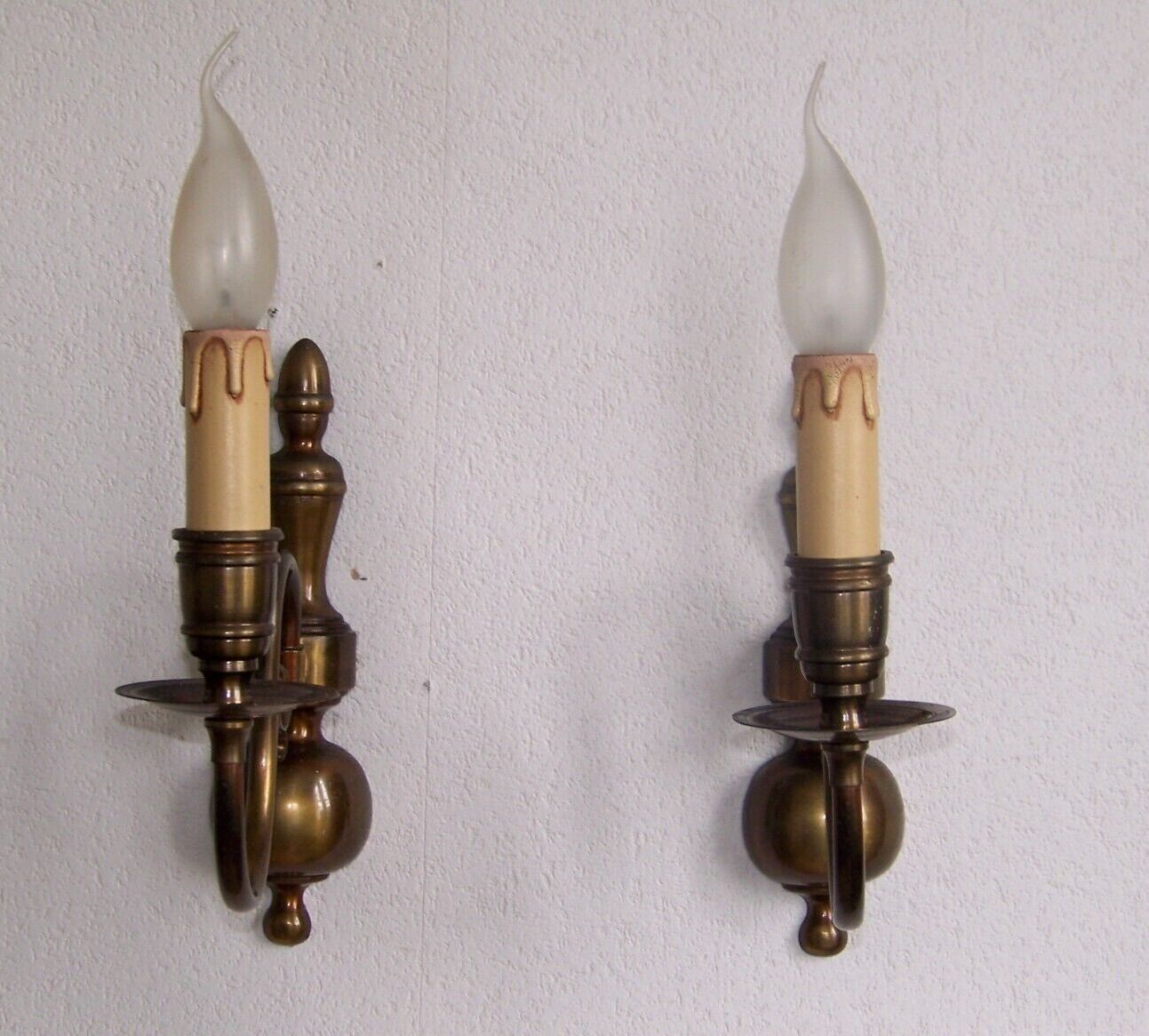 Pair of metal wall sconces