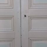 Pair of cupboard doors and old woodwork frame