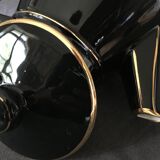 Black and gold ceramic coffee maker