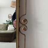 Vintage Hollywood Regency mirror from the 1950s.