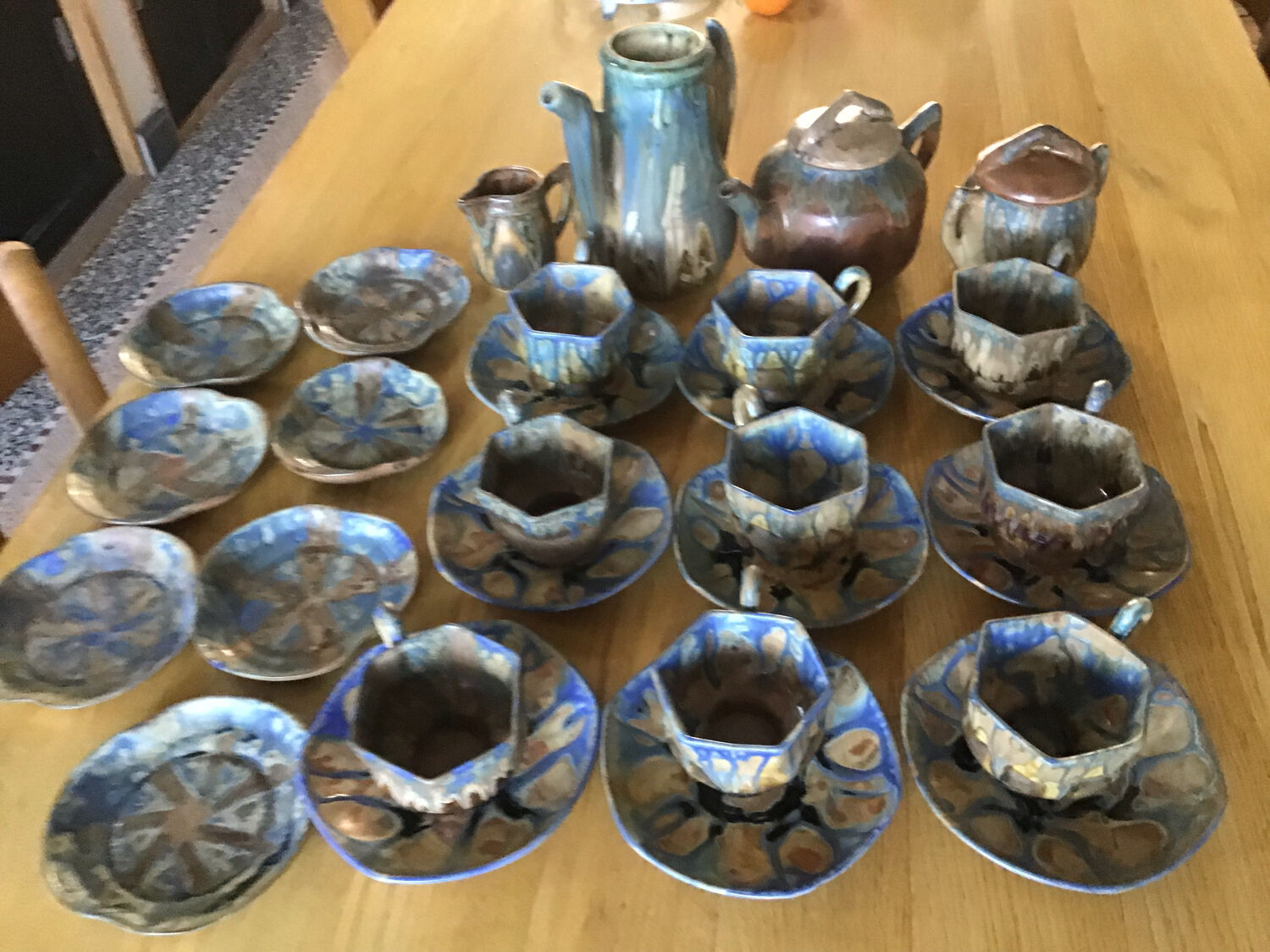 7 stoneware cups signed G Méténier