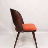 Scandinavian design orange papaya shell dining chairs