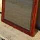 Large antique mirror in a flame mahogany frame; 132x82 cm