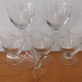 Set of 8 old glasses on base with chiseled decor