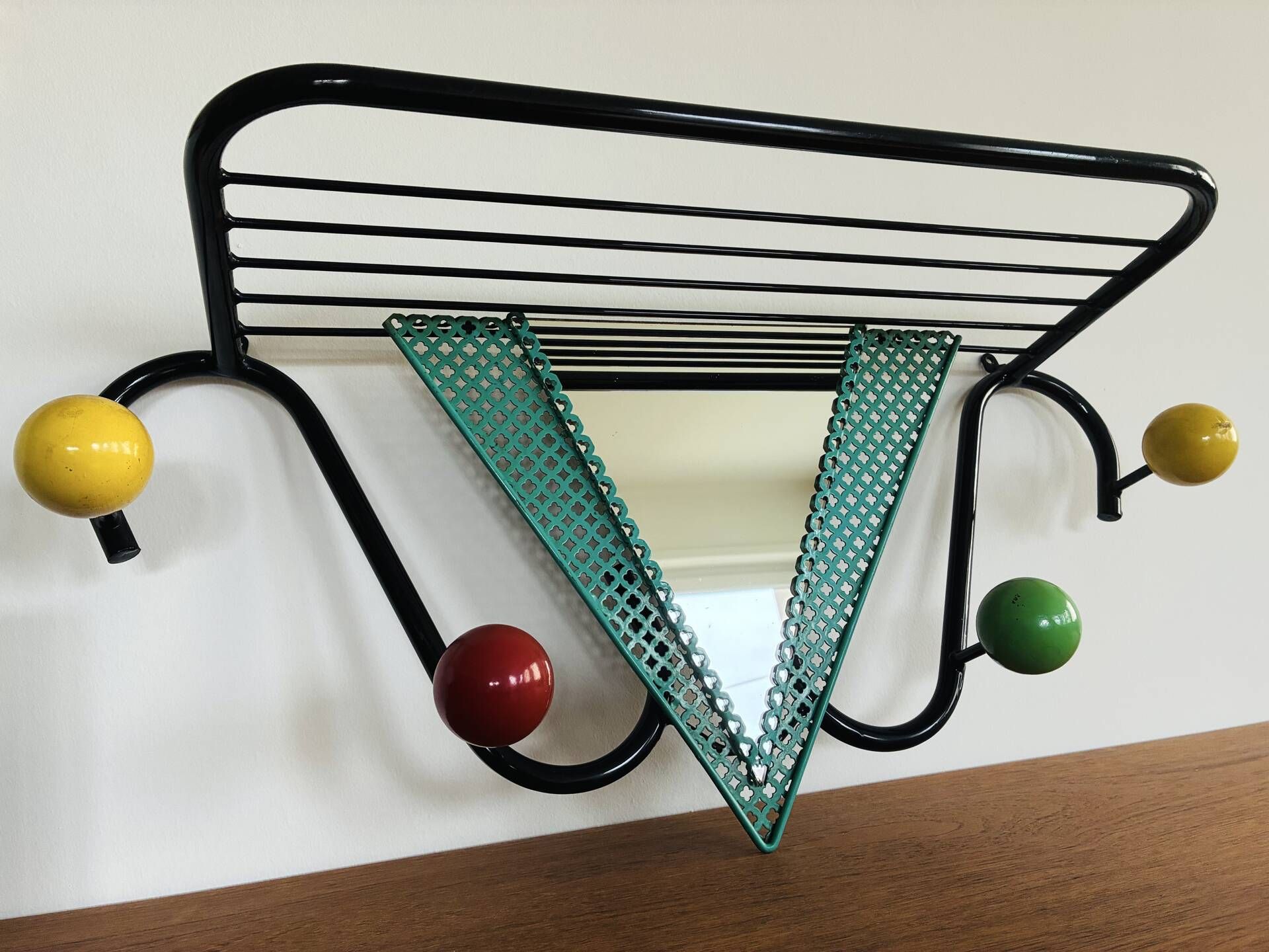 Vintage wall coat rack from the 1950s.