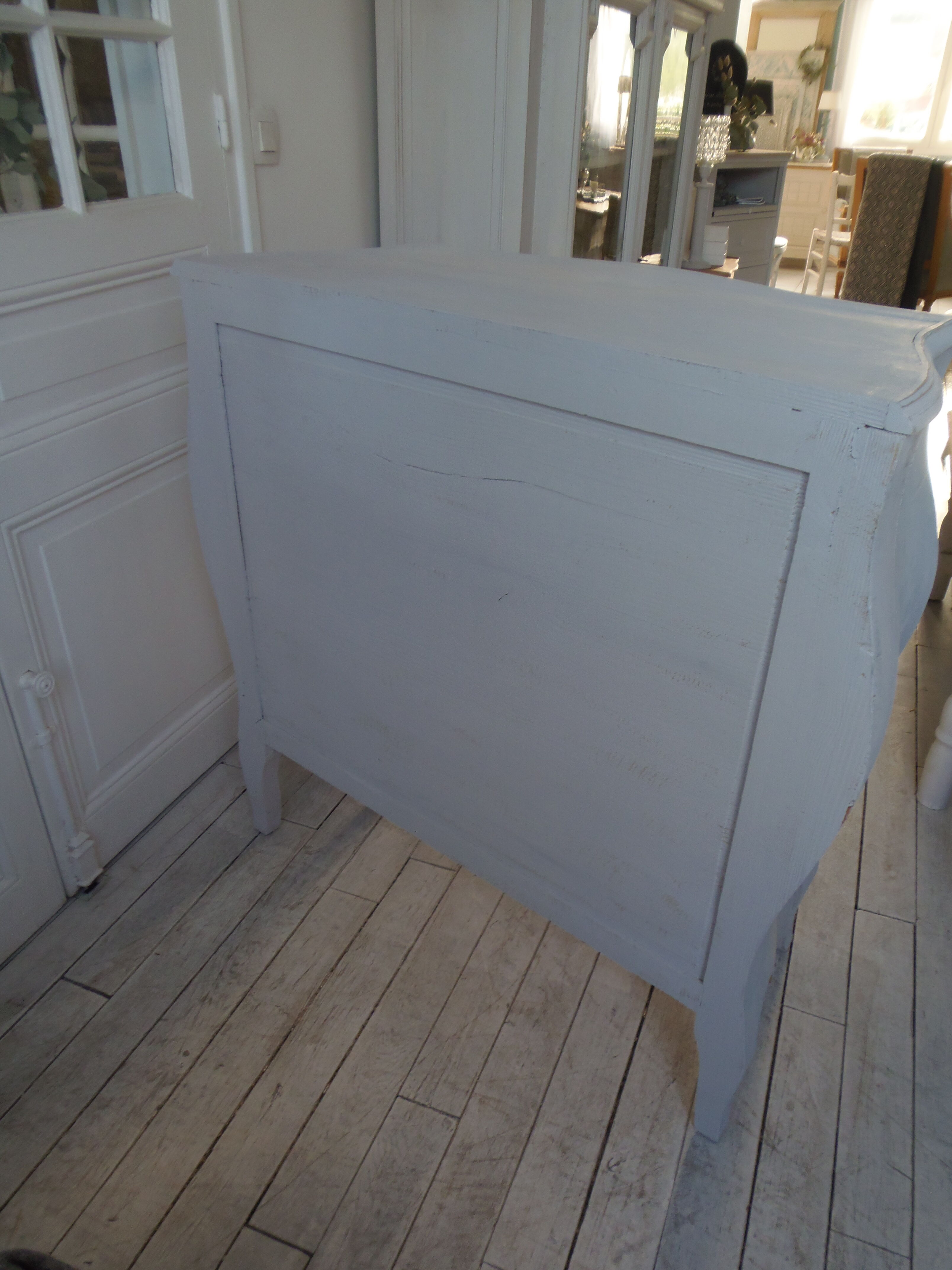 Curved patinated chest of drawers pearl grey waxed finish