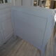 Curved patinated chest of drawers pearl grey waxed finish