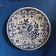 Majestic peacock plate from Dutch earthenware
