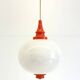 Space Age pendant lamp with milk glass ball and orange accents