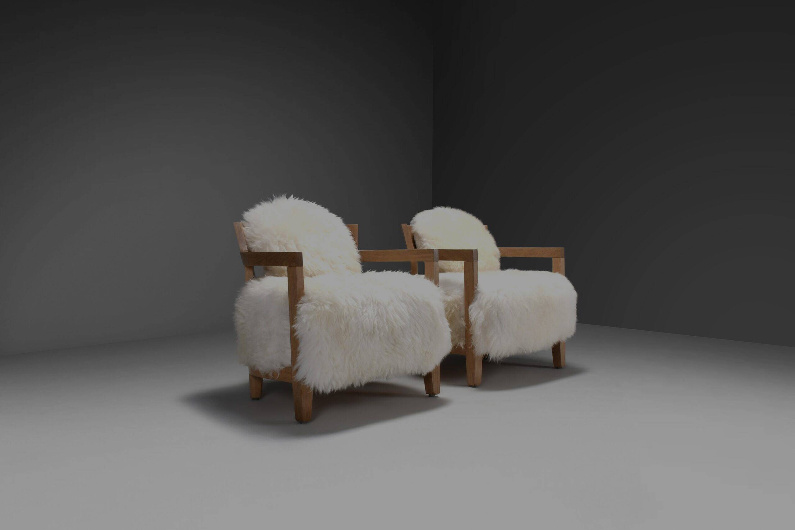 Set of two solid oak and off-white sheepskin chairs, Switzerland, 1970s