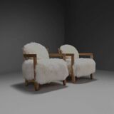 Set of two solid oak and off-white sheepskin chairs, Switzerland, 1970s