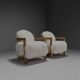 Ensemble de deux fauteuils en chêne massif et peau de mouton blanc cassé, Suisse, années 1970
