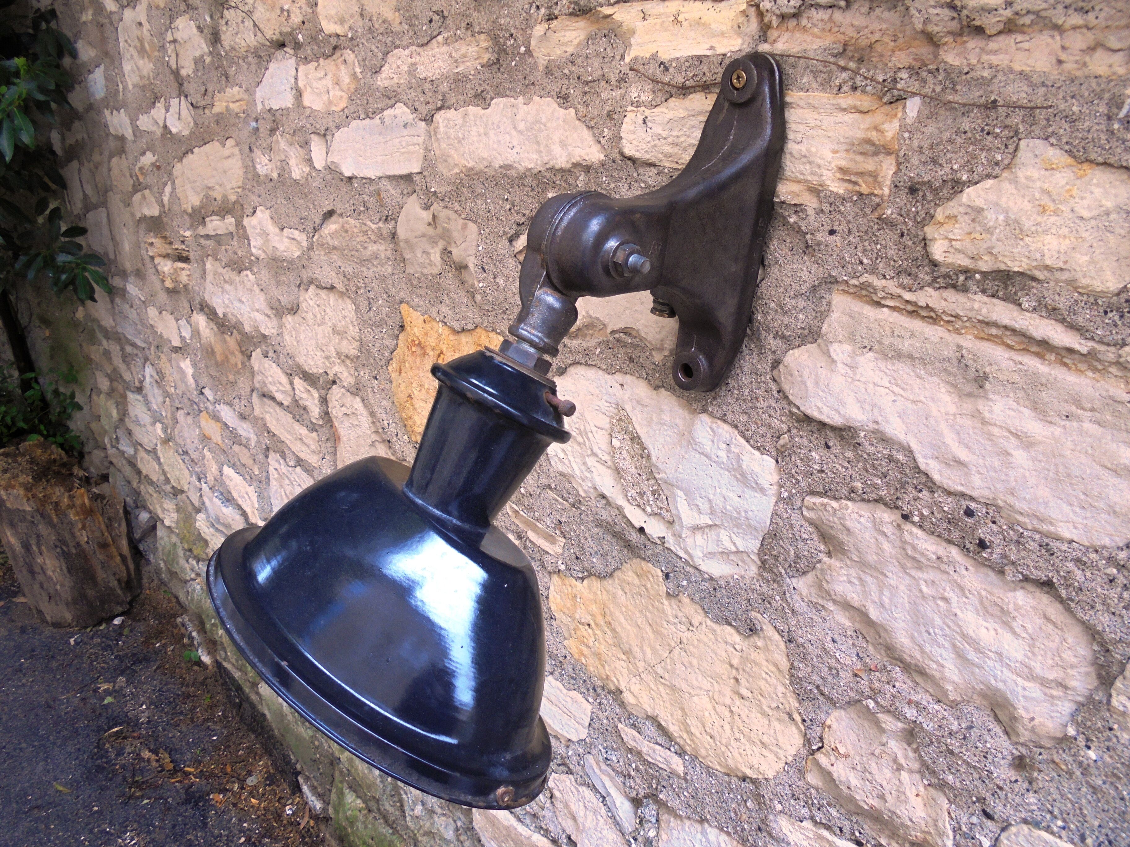 Antique cast iron and enamel wall lamp from the 1930s
