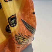 Trompe-l'Œil Ceramic Vase in the Shape of a Knotted Bag with Floral Decoration. Work