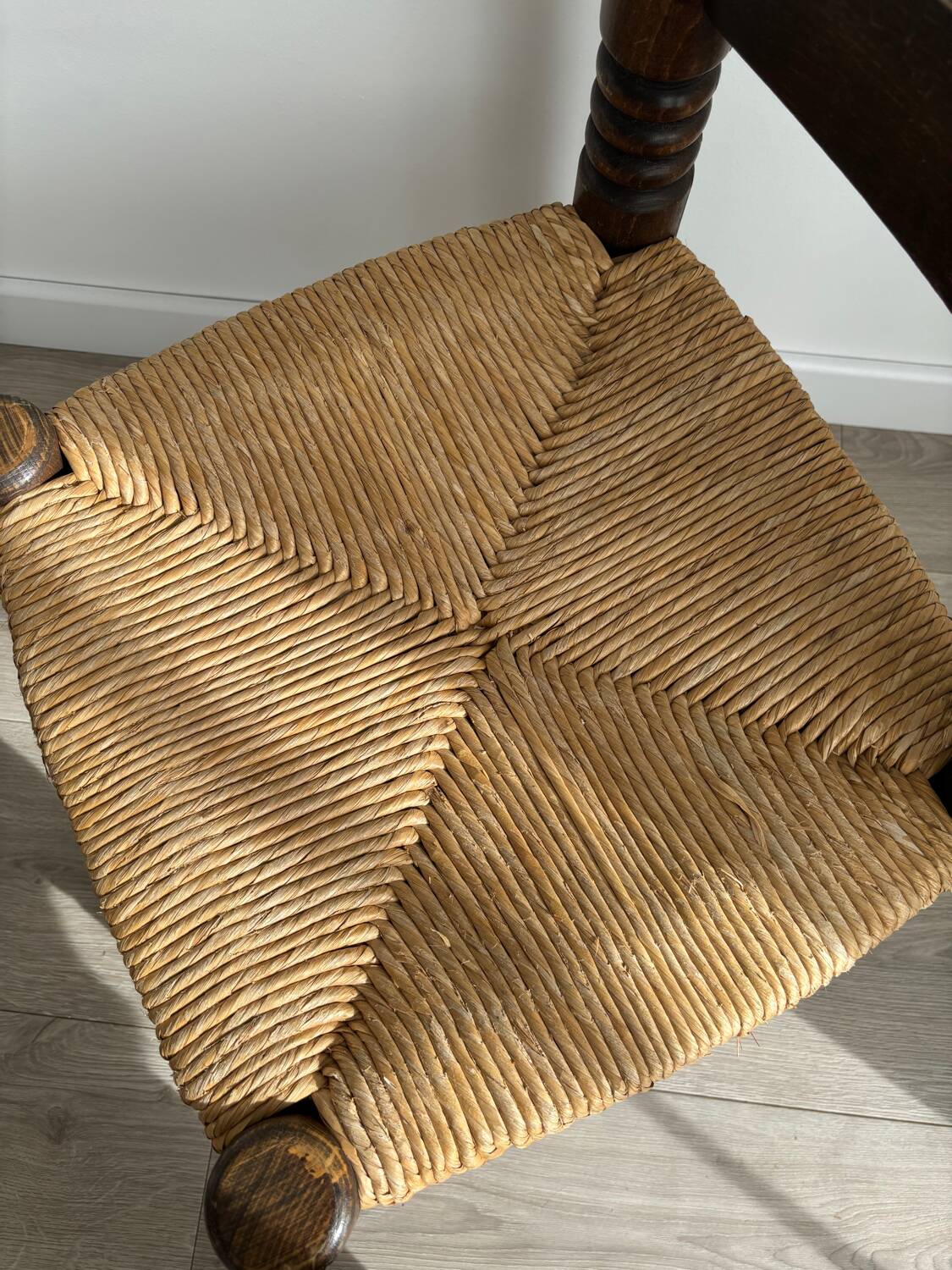 Vintage low chair in the style of Charles Dudouyt – Wooden fireside chair