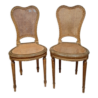 Paire de chaises de musiciens de style louis xvi en bois doré vers 1850