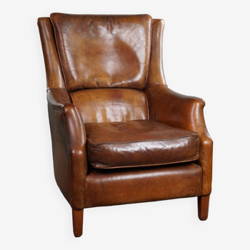 Beautifully aged sheep leather armchair with stunning colors and very comfortable seating