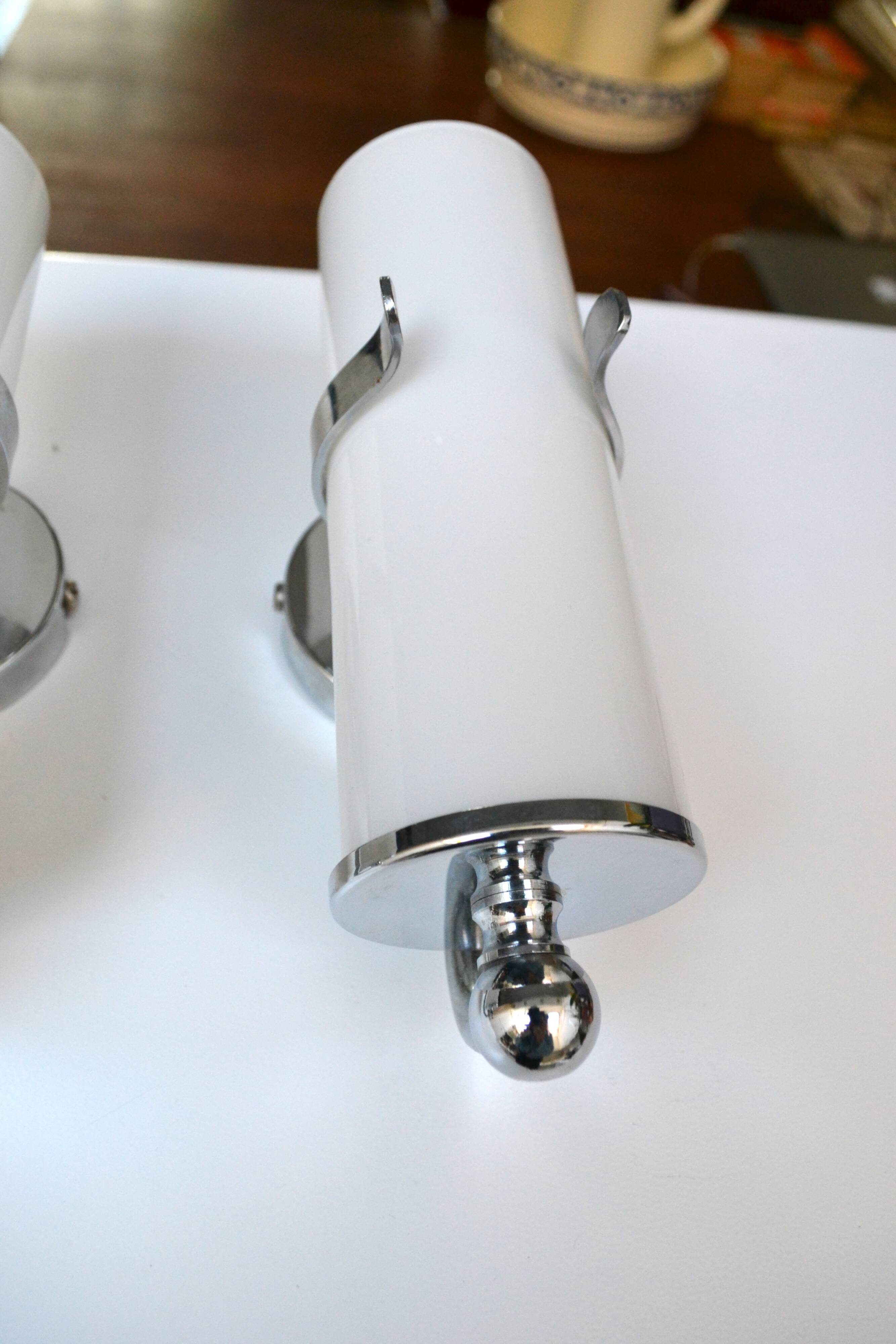Opaline and chrome wall lights from the 1970s.