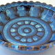 Cut or pocket in polychrome varnished sandstone with a blue and floral decoration