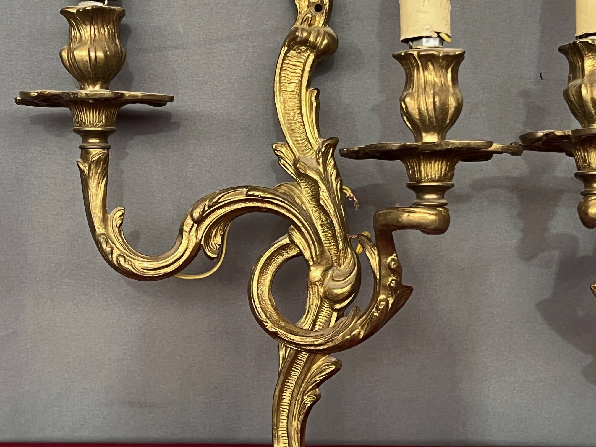 Pair of Rococo gilded solid bronze wall lights.