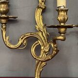Paire d'appliques en bronze massif doré Rococo.