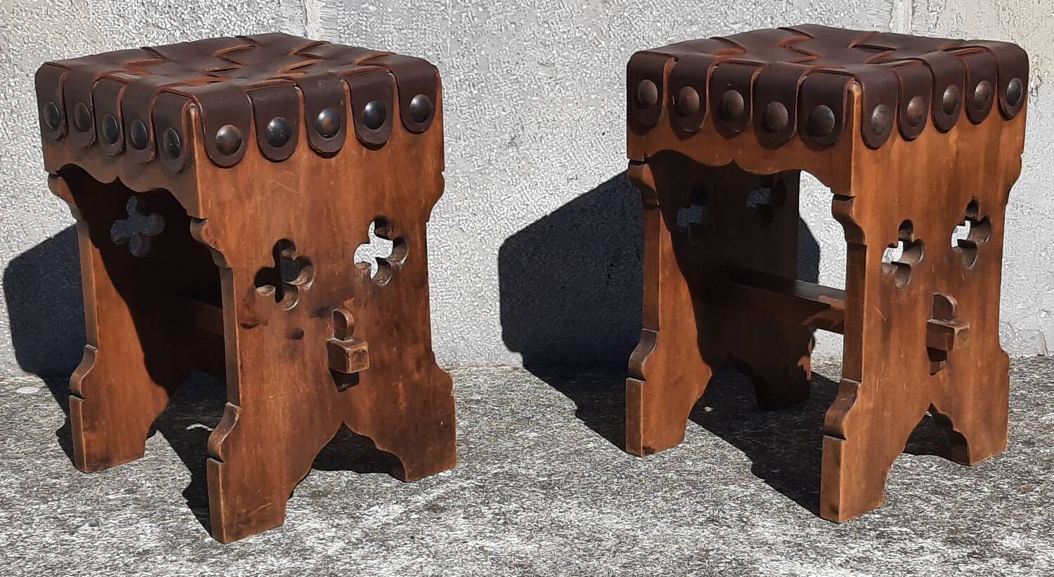 Pair of brutalist stools, leather seat.