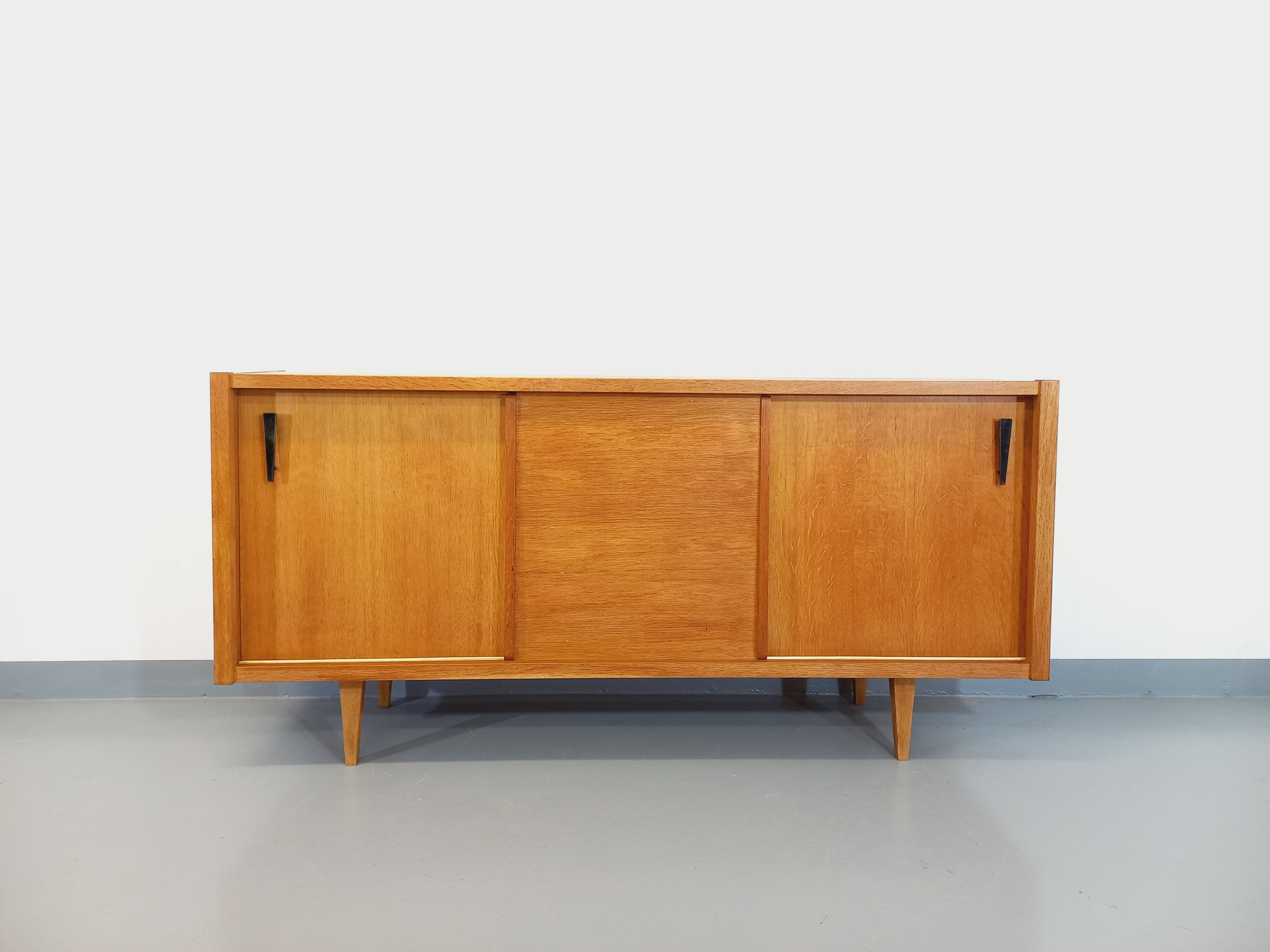 Vintage row in light oak wood from the 60s