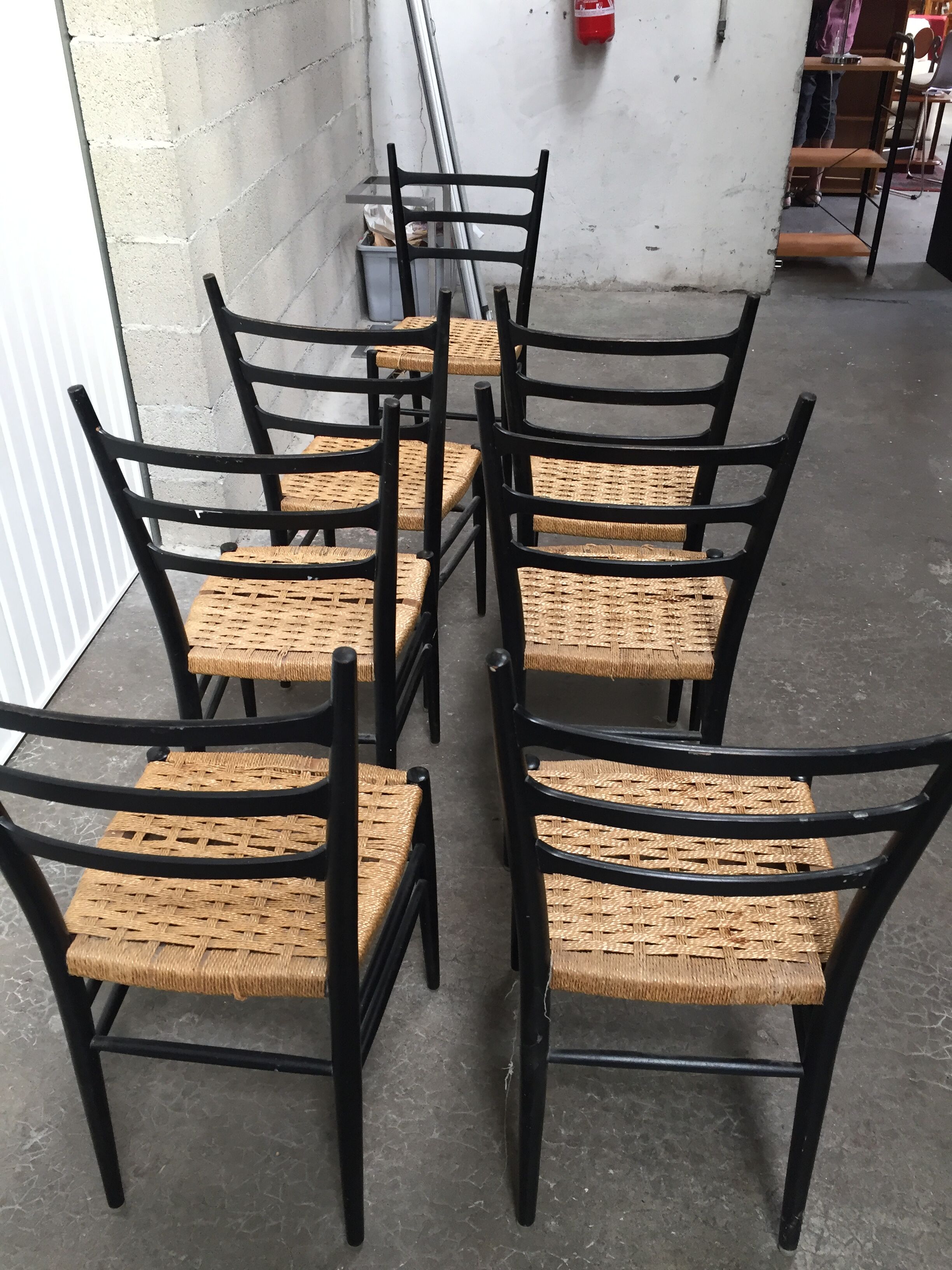 Set of 7 blackened wooden chairs, 1960s vintage