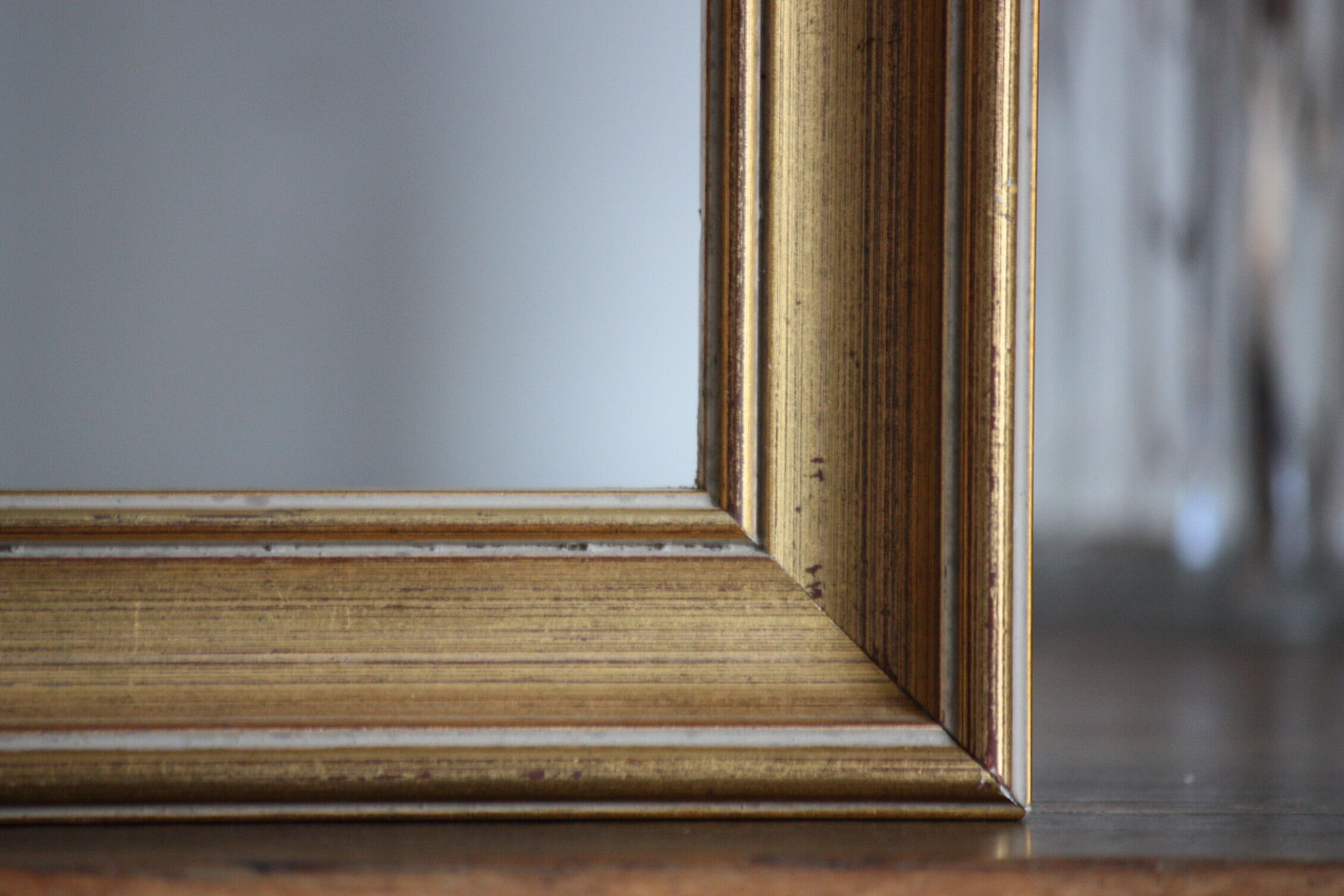 Moulded gilded wood frame