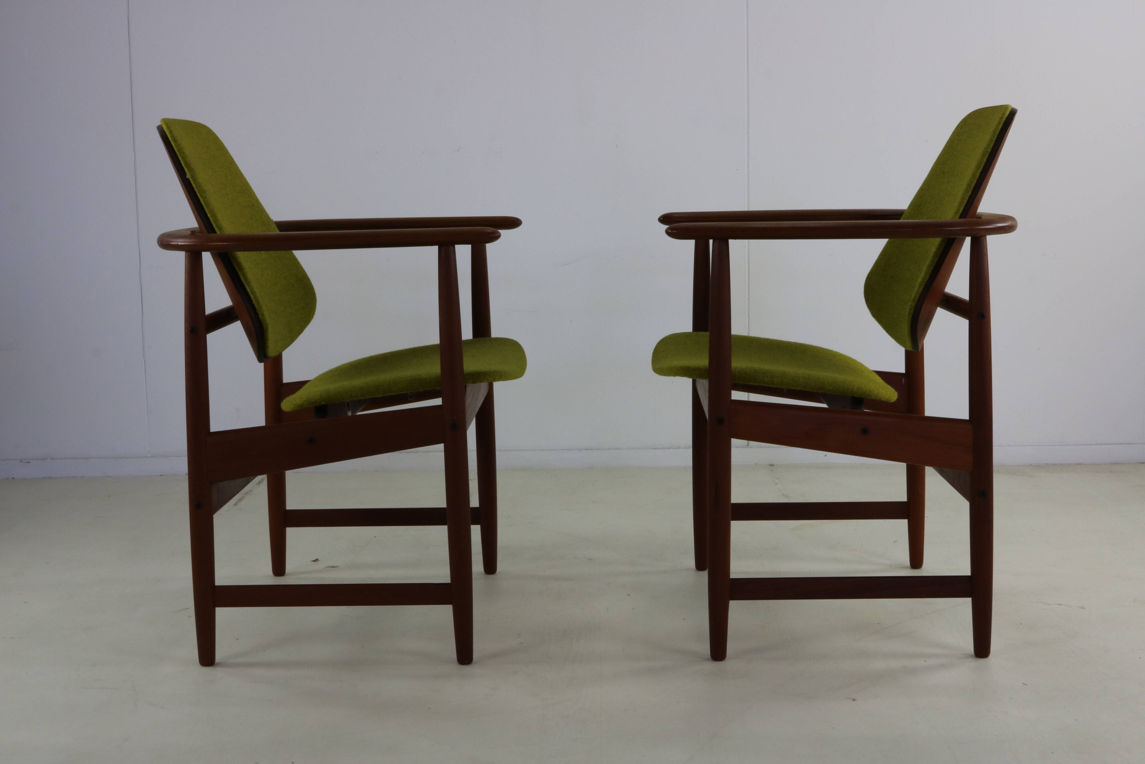 Two Danish design lounge arm chairs by Arne Hovmand Olsen