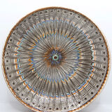 Traditional Romanian plate with psychedelic motifs from Horezu