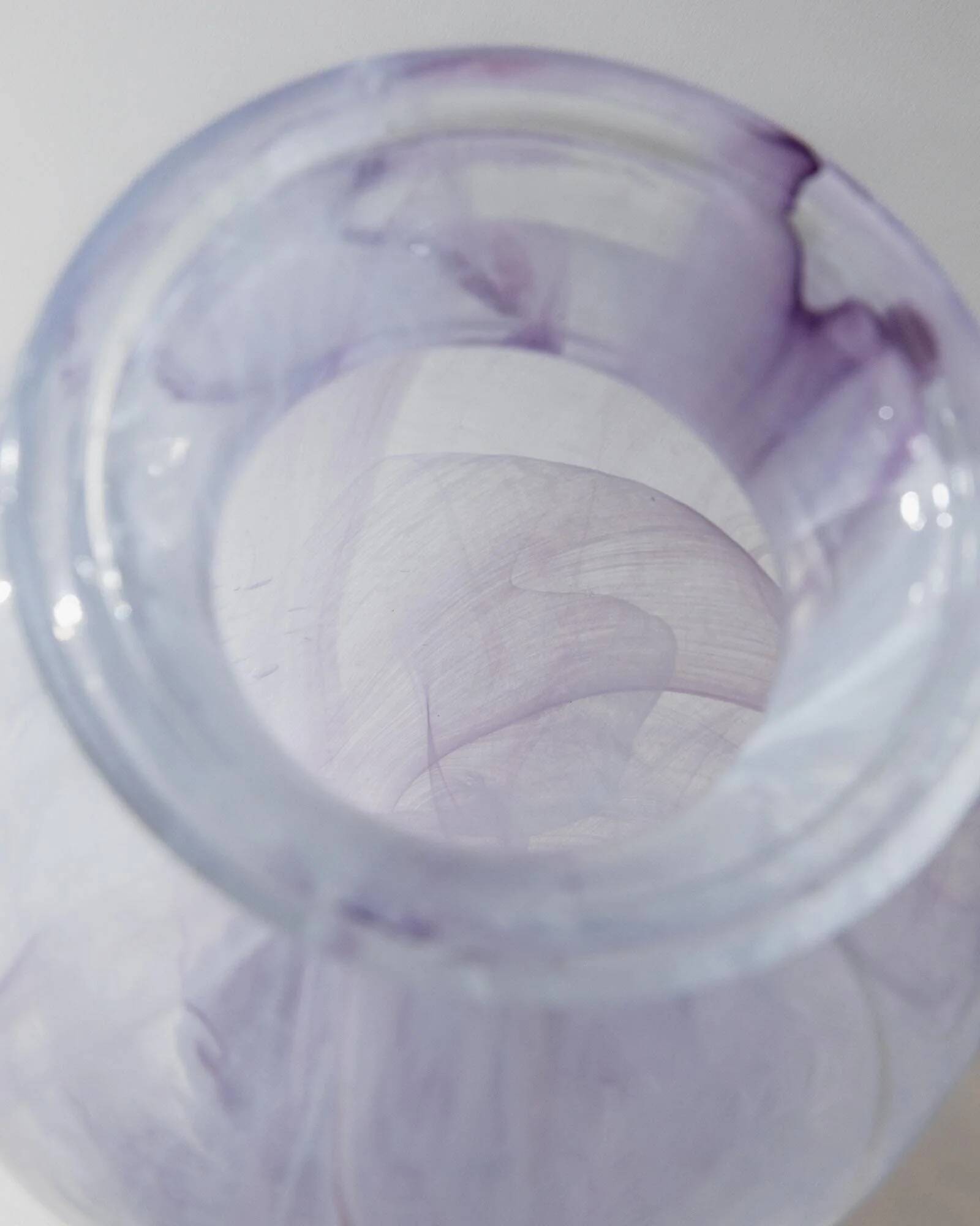 Vintage Murano glass vase from the 1970s, lilac and white swirl.