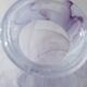 Vintage Murano glass vase from the 1970s, lilac and white swirl.